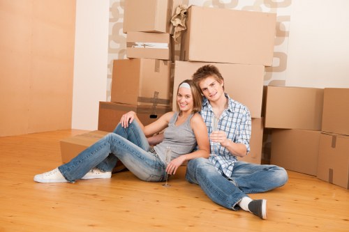 Mover handling furniture in a flat with stairs in Tokyngton