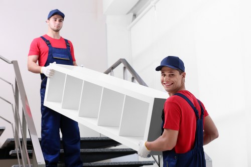 Loading furniture into a van for a Tokyngton home removal