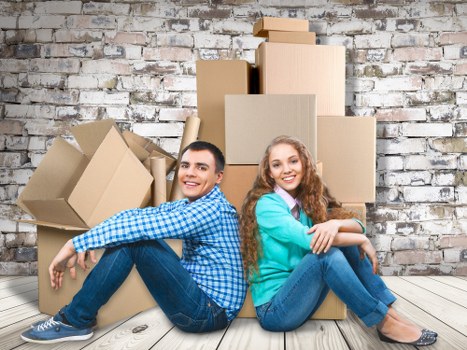 Furniture being carried from a flat during a Tokyngton house move