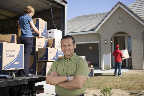 Loading furniture into a removal van for a local move