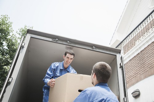 Packed boxes and furniture ready for transport in Tokyngton